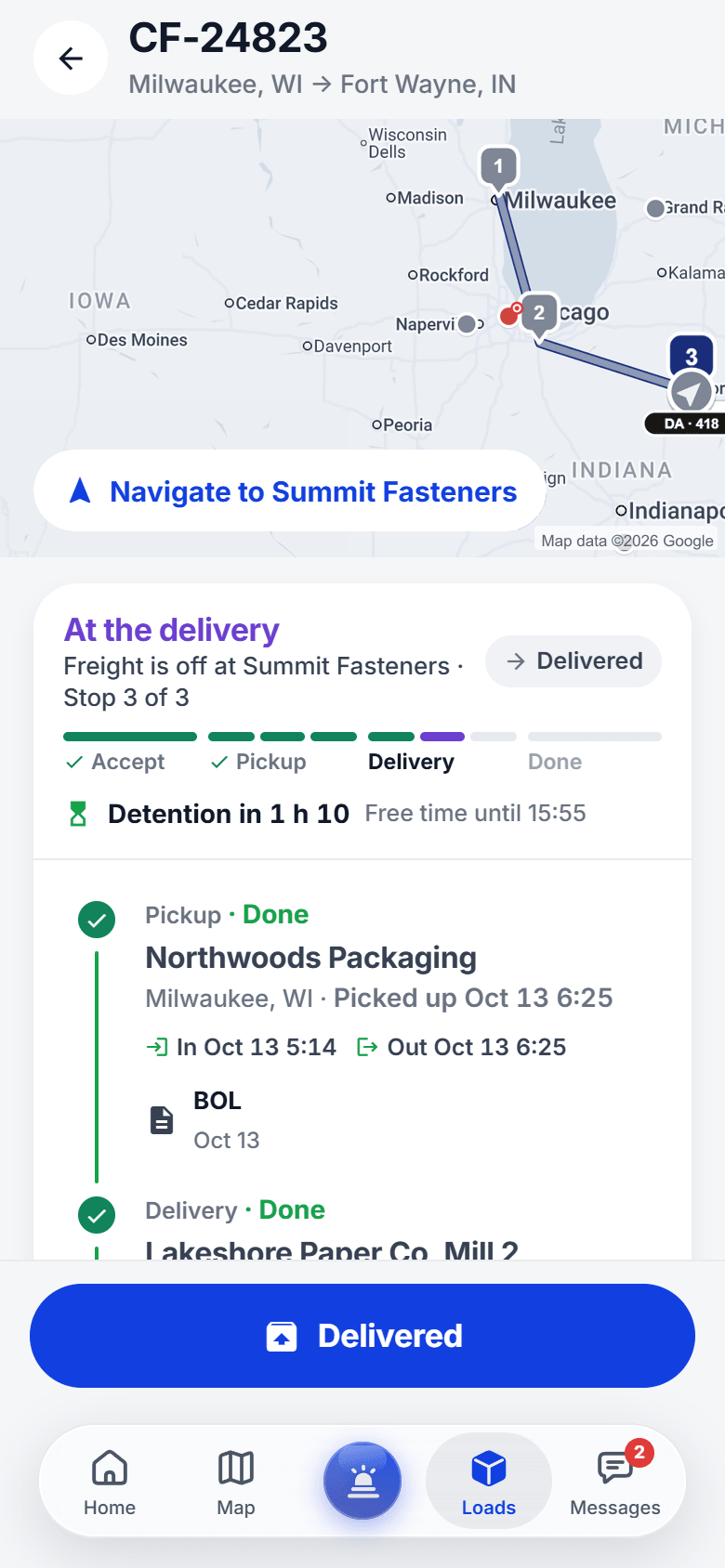 The driver app load screen: the route on a map from Milwaukee to Gary to Fort Wayne, Navigate, where the load stands, detention time and each stop with its times and papers
